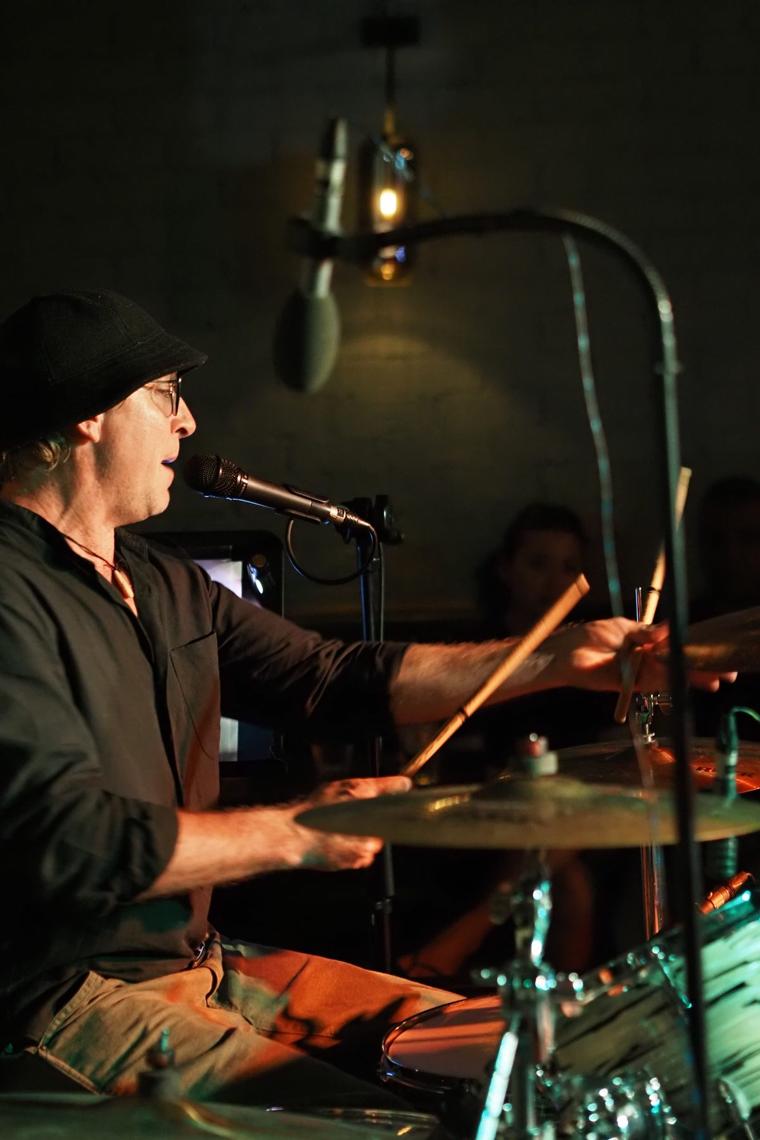 John on drums